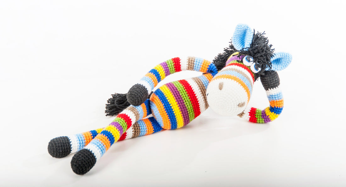 Handmade crochet animal filled with Victory Pellets for balanced weight and cuddly texture–perfect for sensory comfort and gifting.