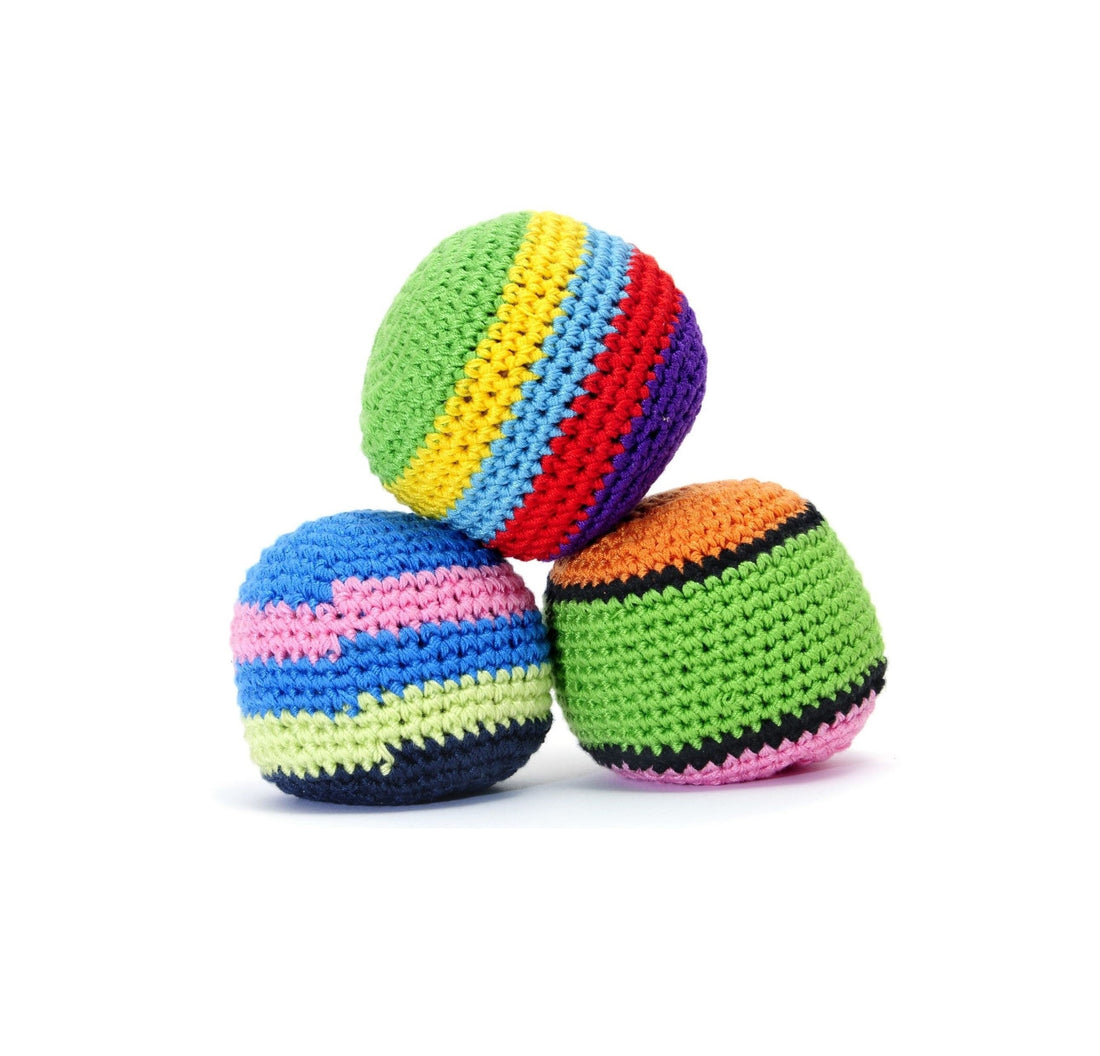 Close-up of a Freestyle Footbag filled with Victory Pellets, showing smooth stitching and bead texture designed for moisture resistance and freestyle control.