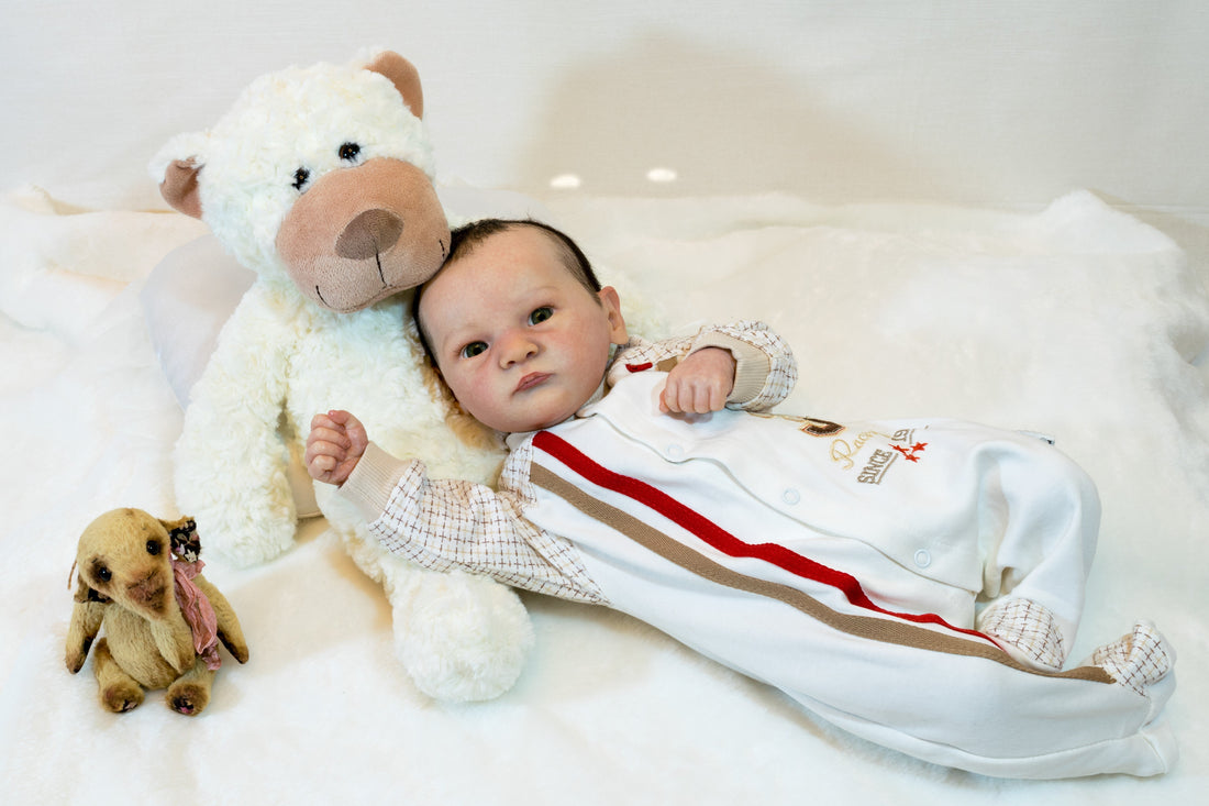 Reborn doll resting its head on a soft stuffed bear, posed peacefully to highlight realistic weight and emotional connection.