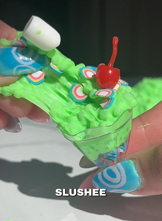 Mini shamrock milkshake slushee slime made by Nichole Jacklyne using Victory Pellets, featured in ASMR video with crunchy texture and St. Patrick’s Day charm