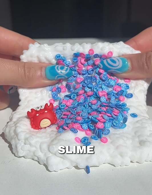 Zodiac-themed slushee slime made by Nichole Jacklyne using Victory Pellets, featured in ASMR video with crunchy texture and celestial charm