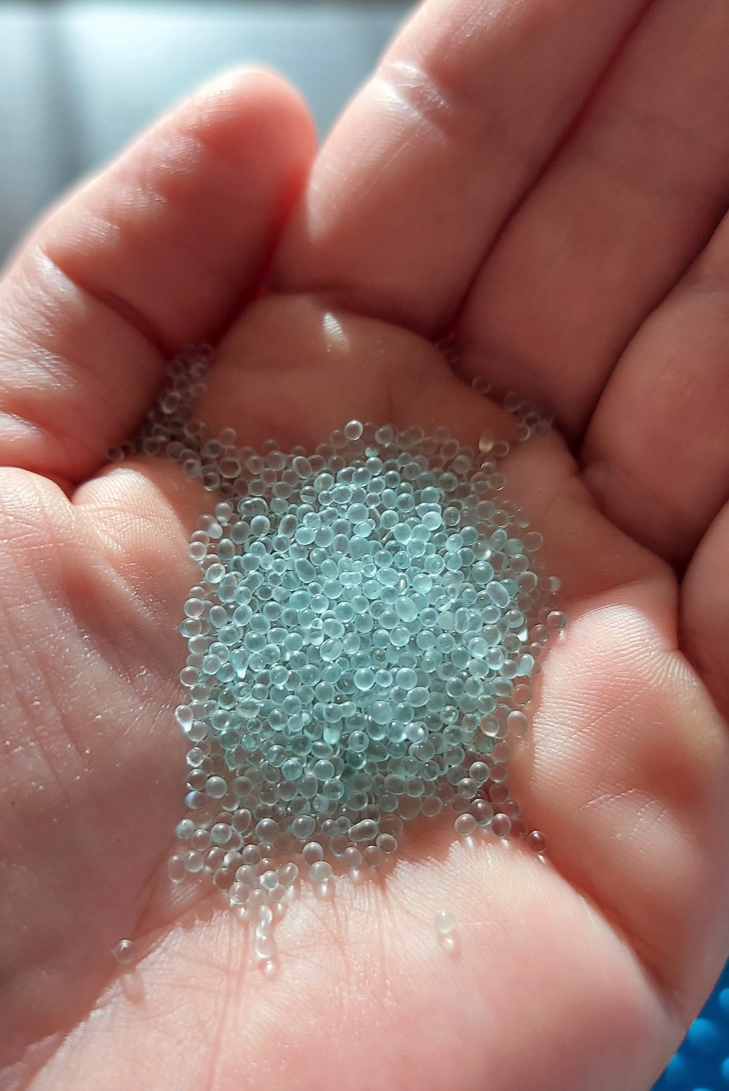 Close-up of Victory Glass Beads – smooth, non-toxic USA-made craft fill for weighted blankets, plush toys, dolls, sensory projects and stuffed animals.