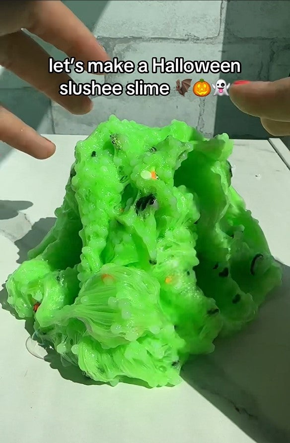 Nichole Jacklyne making Halloween Slushee Slime with Victory Pellets poly beads, witches brew pigment, and ghost, Frankenstein, eyeball, bat, and kettle charms for ASMR play