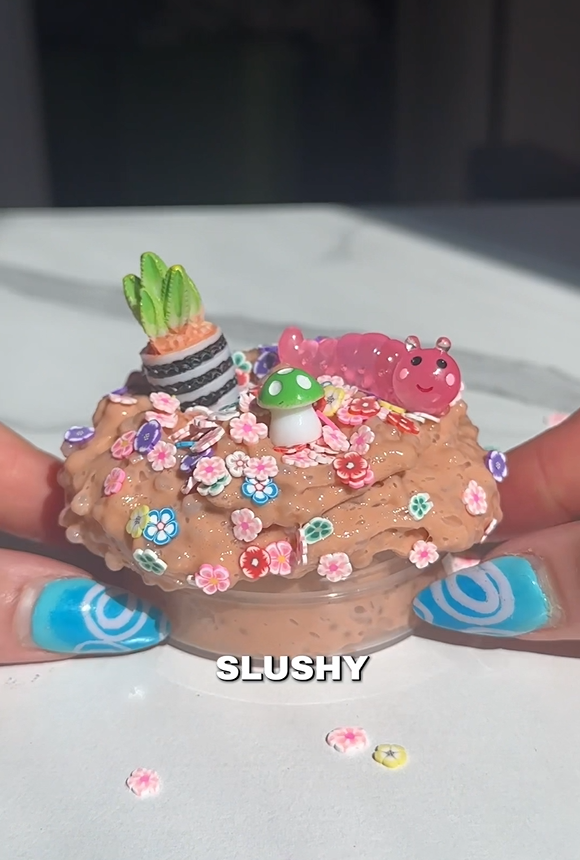 Mini garden slushee slime made by Nichole Jacklyne using Victory Pellets, featured in ASMR video with crunchy texture and botanical charm