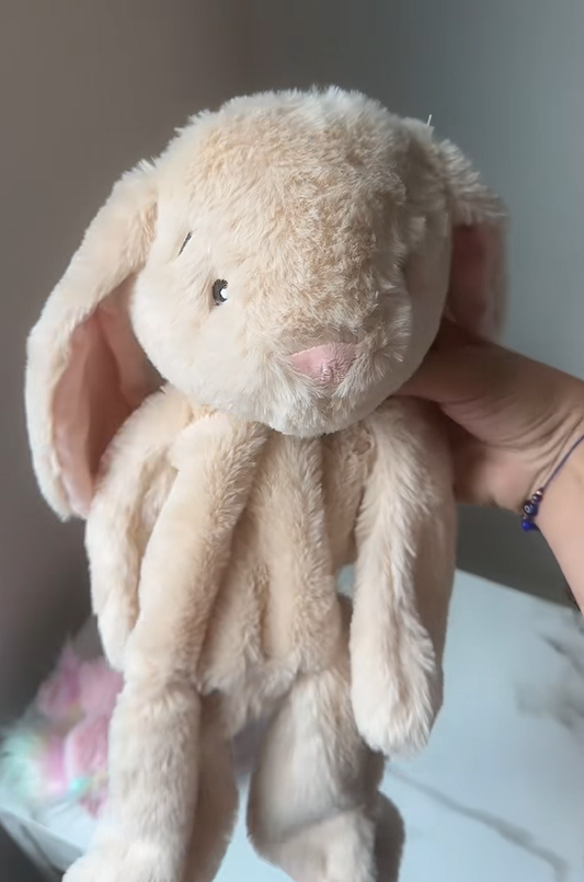Stuffed bunny toy filled with Victory Pellets poly beads, used as a craft filler for plush texture and sensory weight